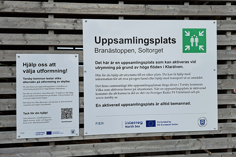 Testskylt uppsatt på toppen av Branäsberget, vid Soltorget.